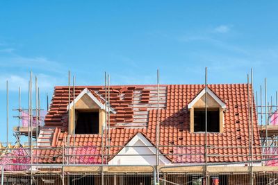 Housebuilder Berkeley to pause buying new land for homes amid global volatility