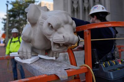 Final gargoyle returned to its perch atop rehabbed Kentucky cathedral modeled after Notre Dame