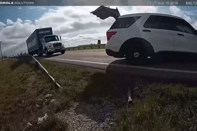 Stolen Bud Light truck plows through police cruiser as it flees cops