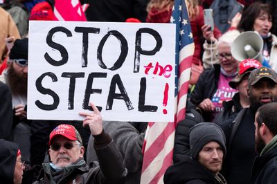 Judge denies Trump effort to end Jan. 6 lawsuits before trial