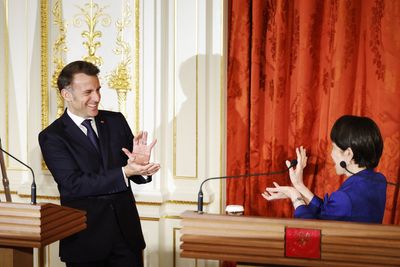 Emmanuel Macron performs Dragon Ball pose during news conference with Japan PM