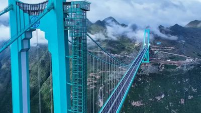 World’s tallest Huajiang Grand Canyon Bridge cuts travel time from 2 hours to 2 minutes and makes ‘Greatest Places 2026’ list