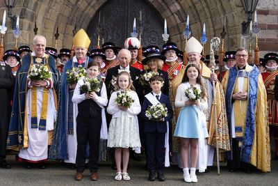 King presents Maundy gifts as service is held in Wales for only the second time