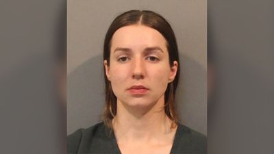 Illinois mother of 2 gives husband sensual massage while holding a gun to his head. Then she shoots him point blank