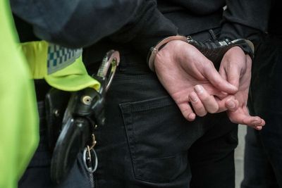 Suspected burglar found asleep by police in child-sized bed