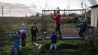 Ukrainian children taken at gunpoint by Russian forces in Kherson, documents show