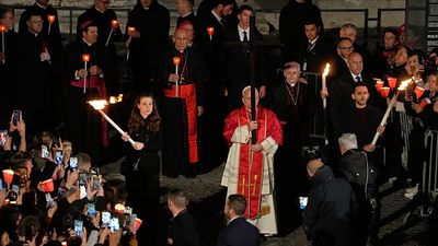 Pope Leo XIV carries cross through all 14 stations at Rome’s Colosseum