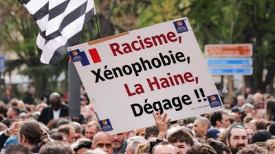 Thousands rally against racism in Paris suburb to defend mayor