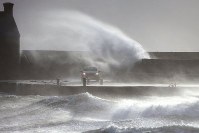 Travel disruption continues as warnings lifted early after Storm Dave