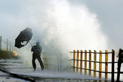 Storm Dave: Homes without power as transport disruption continues