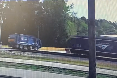 Moment Amtrak train smashes into garbage truck at crossing