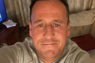 Tributes paid to father killed after being hit by car as police arrest five on suspicion of murder