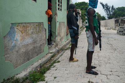 How Haiti’s violent drugs gangs are recruiting hungry homeless children with promises of food