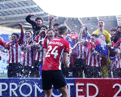 EFL roundup: Lincoln promoted to Championship with win at Reading