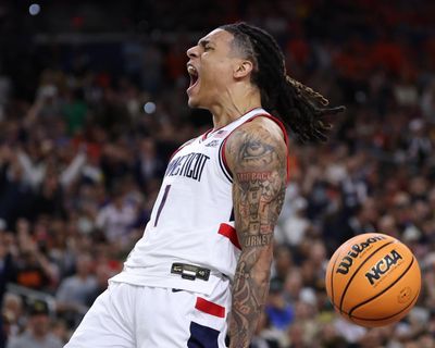 Michigan defeats UConn to win NCAA men’s basketball championship – as it happened