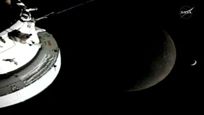 Artemis 2 astronauts fly around the moon in record-breaking lunar loop by NASA