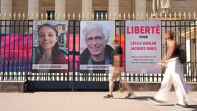 Iran allows two French former detainees to leave the country, Macron says