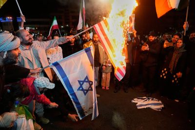 The Latest: Trump pulls back on threats as US, Israel and Iran reach a 2-week ceasefire deal