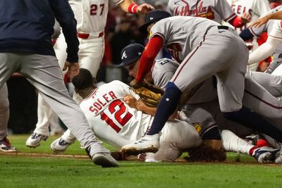 Braves manager speaks out after tackling player in wild on-field brawl