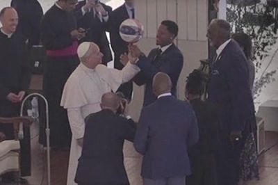 Pope Leo spins basketball on his finger as Harlem Globetrotters teach him classic trick