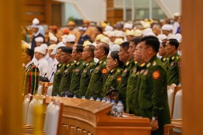 Myanmar's parliament approves cabinet mostly of former generals and holdovers
