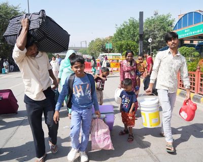 ‘I’ve not had proper food for days’: migrant workers leave India’s cities as Iran war fuel crisis deepens