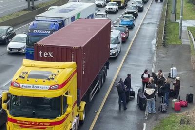 Irish fuel protests: People walk along motorway towards Dublin Airport as blockade continues