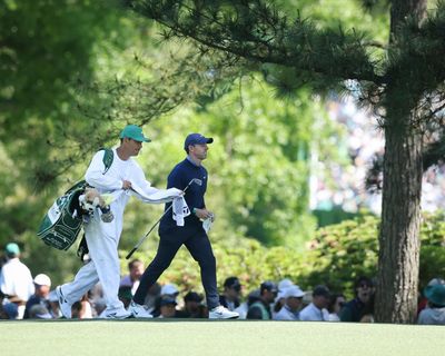 The Masters day two: McIlroy and Reed battle for lead as English trio climb – live