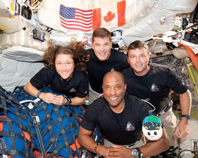 Artemis II crew recovered after ‘textbook splashdown’ – as it happened