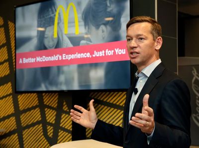 McDonald’s CEO blames mother’s etiquette training for awkward burger bite in video