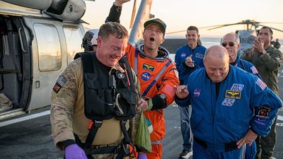 Moment Artemis II capsule splashes down in Pacific