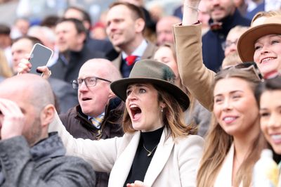 Crowds cheer on as Grand National winner crosses the line