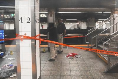 Knife-wielding man shot dead by police after three stabbed at New York subway station