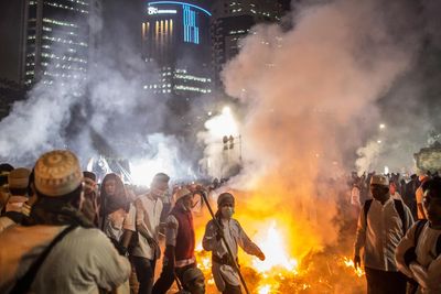 Indonesian women face prison for ‘stepping on Quran’