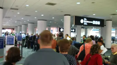 ‘Whoever did this is a total loser’: Woman picks up suitcase at Miami International, spots something on it that stops her cold