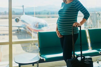 Former flight attendant reveals what really happens if you give birth on a plane