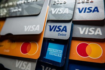 Americans are credit-card-maxing tax season with sign-up bonuses while half the country relies on their refund to catch up on bills