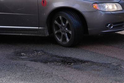 Councils warned they will lose funding if they fail to tackle potholes