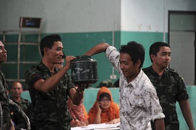 Young Thais react with delight and dismay to ‘Hunger Games’-style military draft lottery