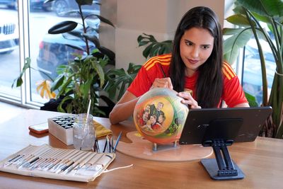 In Miami, soccer balls are turned into one-of-a-kind art as World Cup nears