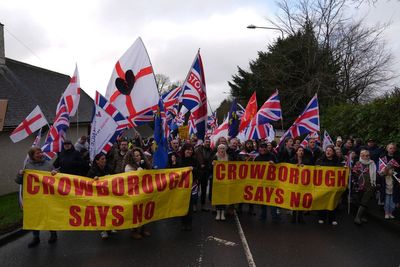 Hundreds of asylum seekers moved to army barracks as more hotels close
