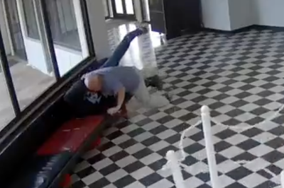 Moment hero principal tackles and disarms would-be school shooter