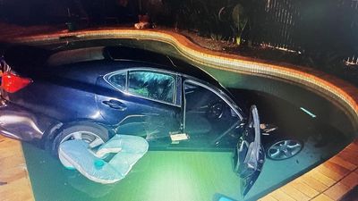 Trail of destruction after car thief drives into pool