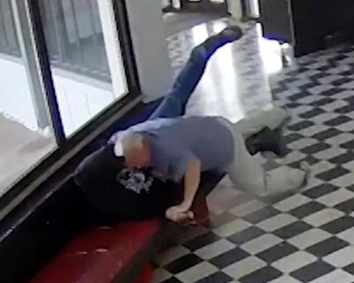 Oklahoma principal shot while tackling ex-student armed with handguns