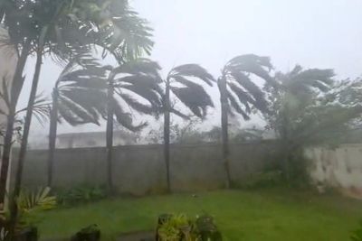 Typhoon flipped over cars and ripped away roofs on US islands in the Pacific Ocean