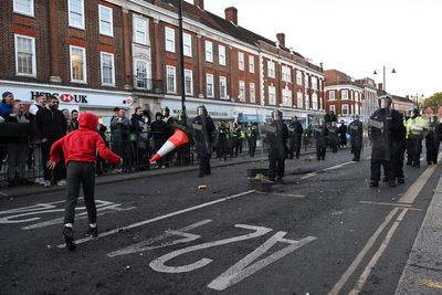 Protesters throw objects at police and demand answers after woman raped in Epsom