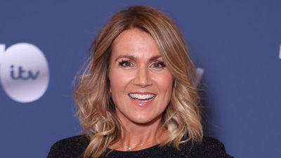 Susanna Reid's elegant blue lace midi is the perfect wedding guest dress