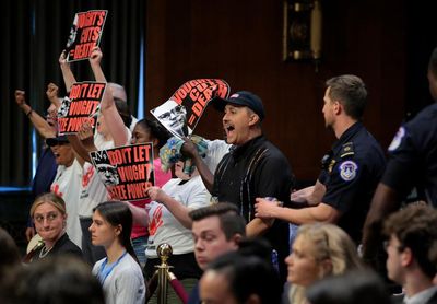 ‘Vought cuts kill people’: Aids activists interrupt Trump budget chief hearing
