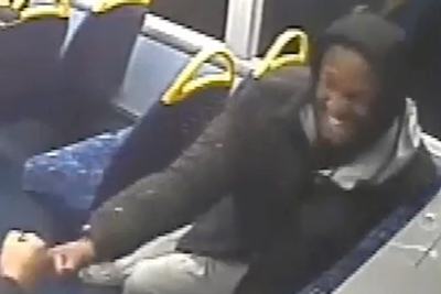 Killer smiles and fist-bumps on bus after murdering university student at train station