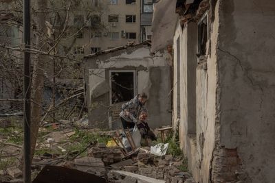 New wave of Russian strikes kill 17 in Ukraine as Zelensky compares Putin to Nazis